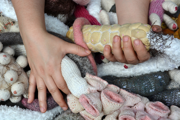Cally Trench, Hands of Rosina Godwin with knitted sculpture,  8th August 2020